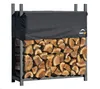 A black fabric cover is draped over a metal firewood rack filled with logs. Náhľad obrázku produktu