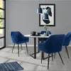A dining room scene with a round table and four chairs. Náhled obrázku produktu