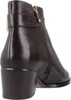 A close-up side view of a brown leather ankle boot with a heel and a zipper. Voir les images du produit