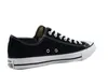 A black Converse All Star OX Uni Sneaker is shown from the side against a white background. Voir les images du produit