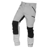 A pair of gray and black outdoor work pants are shown against a white background. Produktbild-Vorschau