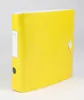 A yellow binder is shown against a white background. Voir les images du produit