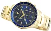 A close-up, angled shot of a gold Maserati watch with a blue face. Produktbild-Vorschau
