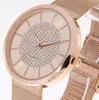 A close-up shot of a rose gold Excellanc women's watch with a mesh band. Produktbild-Vorschau