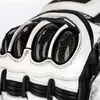 Close-up of a motorcycle glove, showing the protective knuckle guards. Podgląd zdjęcia produktu