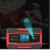 A car battery charger is shown with a digital display and various icons. A fingerprint graphic is overlaid on the image, suggesting a smart or secure feature. Produktbild-Vorschau