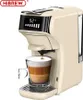 A beige coffee machine is brewing coffee into a glass cup. Produktbild-Vorschau