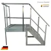 A silver metal staircase with a platform. Podgląd zdjęcia produktu