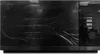 A black Samsung microwave oven with a protective plastic film on the door. Produktbild-Vorschau