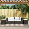 An outdoor patio scene with a wicker sofa and side tables under a wooden pergola. Produktbild-Vorschau
