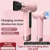 A pink wireless hair dryer with gold accents is shown, with text overlays highlighting its features and benefits. Podgląd zdjęcia produktu