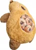 A plush toy capybara with several smaller capybara plushies inside its belly. Anteprima dell’immagine prodotto