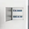 An open electrical distribution box with circuit breakers. Voir les images du produit