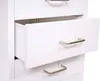 A close-up view of a white metal filing cabinet with one drawer partially open. Produktbild-Vorschau