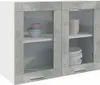 A white and gray cabinet with glass doors, displaying dishes and bowls on shelves. Produktbild-Vorschau