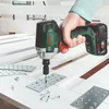 A person is using a Bosch cordless impact driver to attach a metal plate to a wooden surface. Podgląd zdjęcia produktu