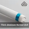 Close-up of an LED tube light with a blue band and metal casing. Produktbild-Vorschau