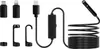 A collection of black electronic accessories, including adapters, clips, and a coiled cable with a camera at the end, laid out on a white background. Produktbild-Vorschau