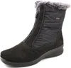 A black winter boot with a zipper and fur trim. Náhľad obrázku produktu