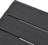 A close-up view of the textured surface of a dark-colored outdoor furniture set. Produktbild-Vorschau