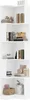 A white corner bookshelf filled with books and decorative items. Voir les images du produit