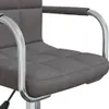 Close-up of a dark gray fabric chair seat and armrests with chrome accents. Produktbild-Vorschau