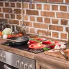 A kitchen counter with a stovetop and backsplash. Produktbild-Vorschau