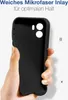 A hand holding a black phone case against a light gray and white background. Produktbild-Vorschau