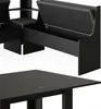 A close-up view of a black corner bench and table set. Náhled obrázku produktu