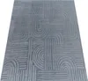 A gray rug with a geometric pattern is shown from a diagonal angle on a white background. Anteprima dell’immagine prodotto