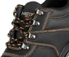 Close-up of a black work boot with orange stitching and laces. Anteprima dell’immagine prodotto