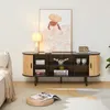 A TV stand is shown in a living room setting, with a sofa and rug. Produktbild-Vorschau