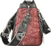A close-up side view of a red and gray handbag with decorative stitching and a patterned strap. Produktbild-Vorschau