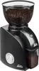 A black electric coffee grinder with a clear hopper filled with coffee beans. Podgląd zdjęcia produktu