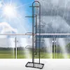 A black metal plant stand is shown on a balcony, with the background split between a sunny sky and a rainy sky, suggesting its suitability for different weather conditions. Anteprima dell’immagine prodotto