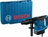 A blue Bosch SDS-Max hammer drill and its blue carrying case are displayed against a white background. Produktbild-Vorschau