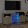 A TV stand with LED lighting is shown in a dimly lit room. Náhled obrázku produktu