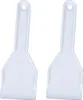 Two white plastic ice scrapers are shown against a white background. Produktbild-Vorschau