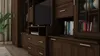 A close-up view of a modern entertainment center with a television, shelves, and drawers. Produktbild-Vorschau
