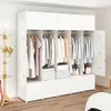 A white modular wardrobe filled with clothes, storage boxes, and bags. Voir les images du produit
