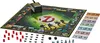 A Ghostbusters-themed Monopoly board game is laid out on a white surface, with game pieces and money scattered around it. Produktbild-Vorschau
