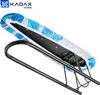 A close-up view of a small ironing board with a striped cover, resting on its metal stand. Produktbild-Vorschau
