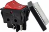 A close-up studio shot of a red rocker switch with a protective cover. Náhľad obrázku produktu