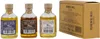 Three small bottles of liquor and a cardboard gift box. Produktbild-Vorschau