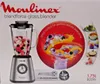 The image shows the packaging of a Moulinex blender. The front of the box features a picture of the blender filled with fruit, along with marketing text and images of various blended drinks. Voir les images du produit