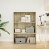 A bookshelf filled with books and decorative items, next to a desk with a lamp. Náhľad obrázku produktu