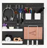 A pegboard wall organizer with various items attached. Produktbild-Vorschau