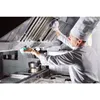 A chef cleaning a commercial kitchen exhaust hood. Produktbild-Vorschau