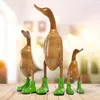 Handgefertigte Deko-Figur Ente mit grünen Stiefeln aus Produktbild-Vorschau 1