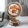 A wooden globe model with gears and lights sits on a table. Náhľad obrázku produktu